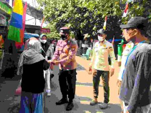 Bagikan 1.000 Masker ke Warga Polres Kep Seribu sampaikan Imbauan Taat ProKes