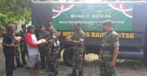 Peduli Kepada Sesama, Brigif MR 6 Kostrad Berbagi Kebahagiaan Dengan Masyarakat