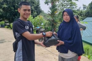 Meningkatkan Kesejahteraan Masyarakat, Yonarmed 10 Kostrad Panen Jagung dan Dibagikan Ke Masyarakat