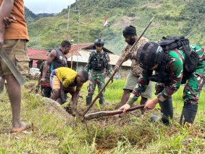 Satgas Yonif 433 Kostrad, Kerja bakti Membangun Irigasi dan Revitalisasi Gereja